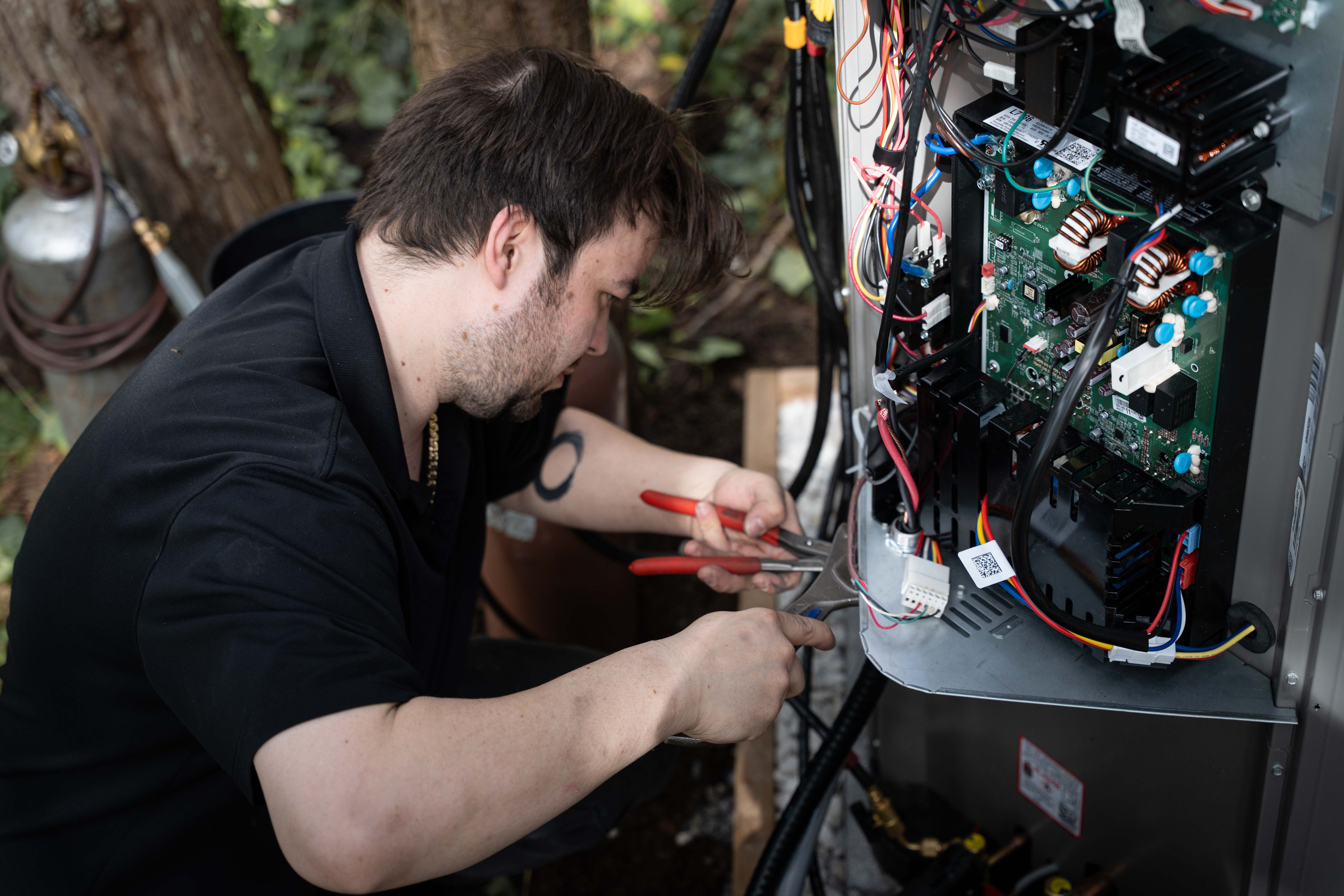 Grove tech wiring heat pump control board during installation