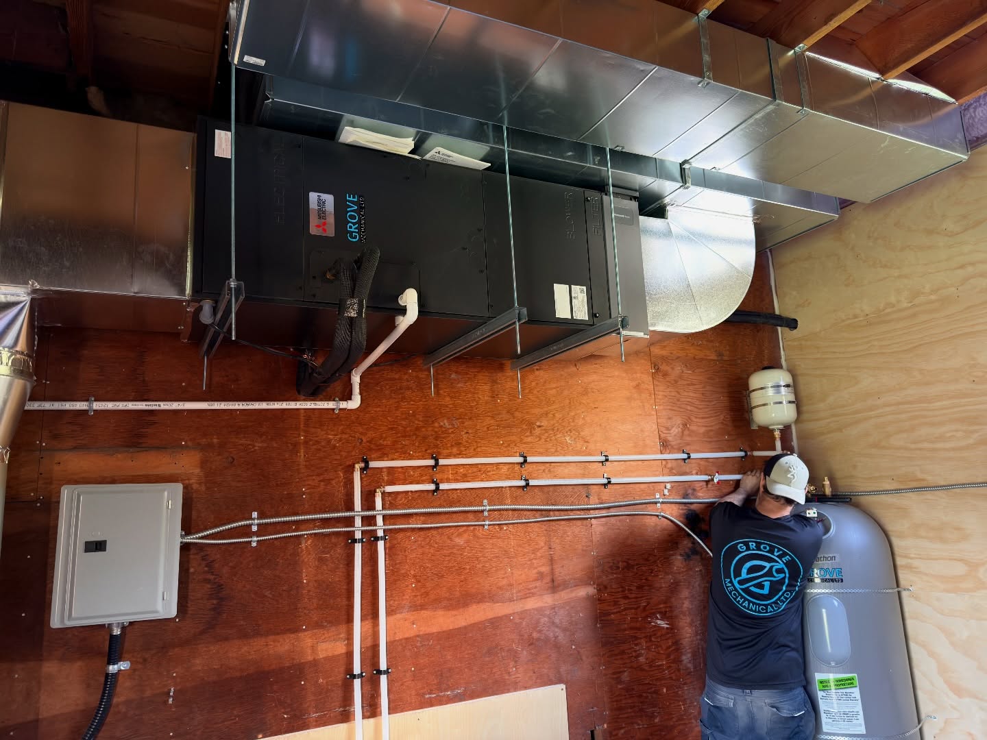 Mitsubishi Zuba cold climate heat pump + 200A panel upgrade by Grove Mechanical